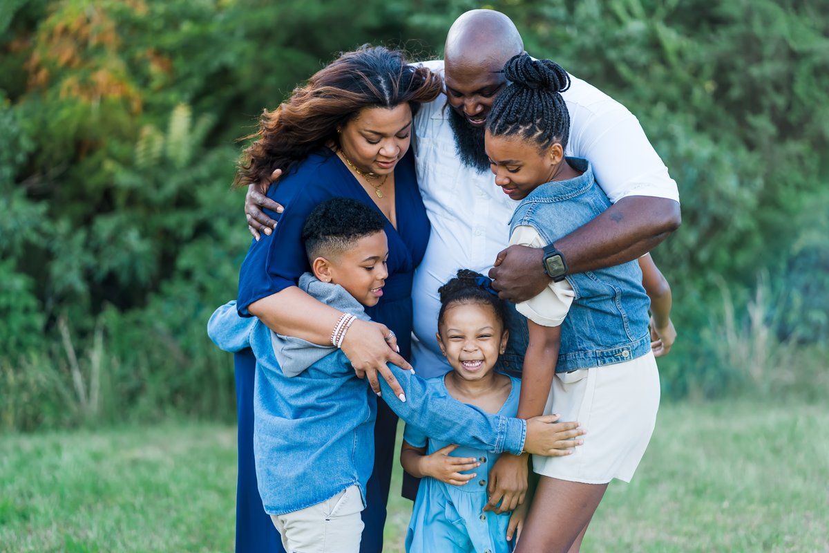 Happy family with financial relief after using AccessOne hospital payment plan